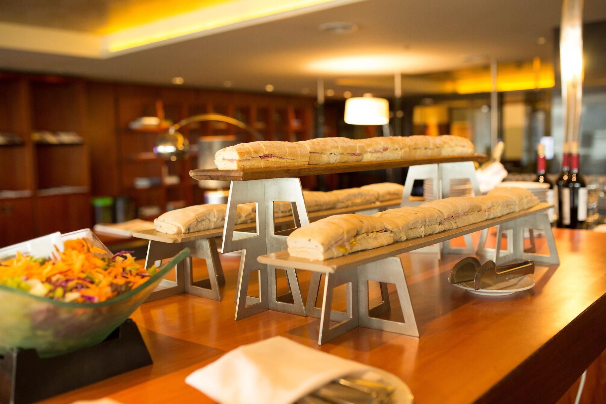 Hilton Buenos Aires Hotel Exterior photo Baguettes at a buffet