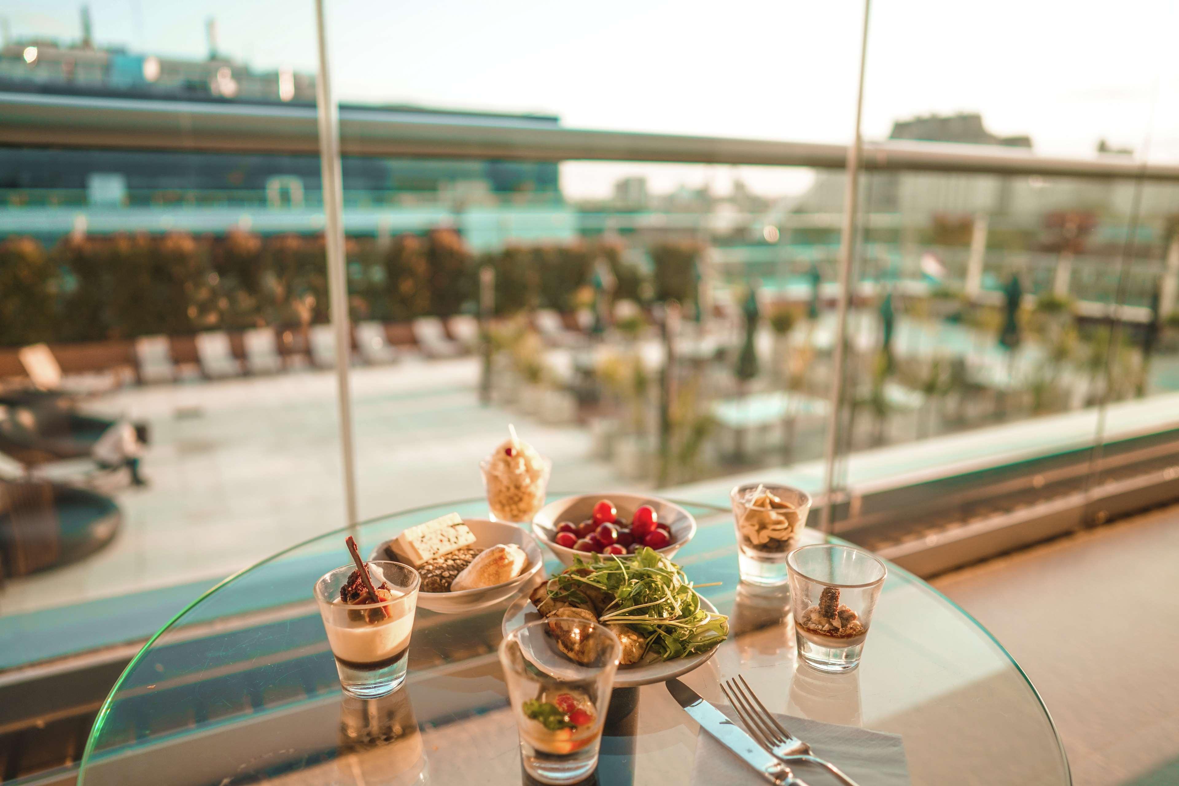 Hilton Buenos Aires Hotel Exterior photo A selection of desserts at the Sky Bar
